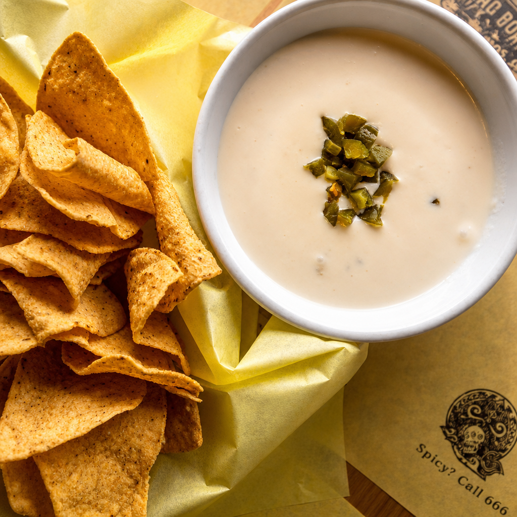 Chips and 6oz White Queso.
