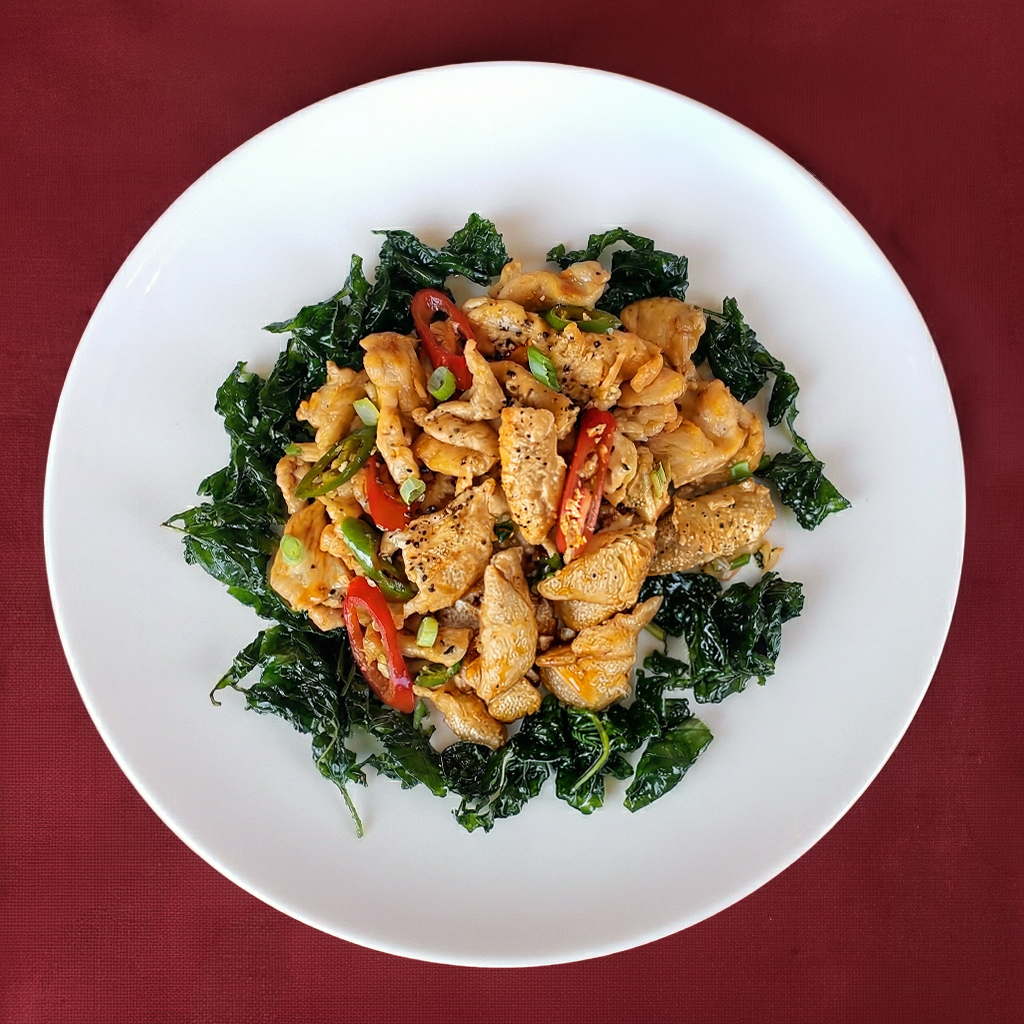F12. Sautéed Sliced Chicken with Hot Pepper and Crispy Spinach.