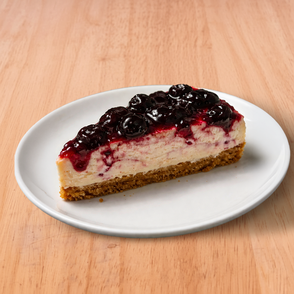 Cheese Cake with blueberry sauce.