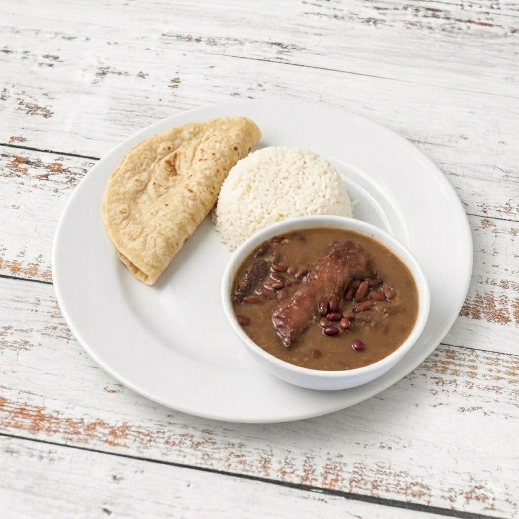 Sopa De Frijoles Con Chicharron/Beans and pork rind soup.