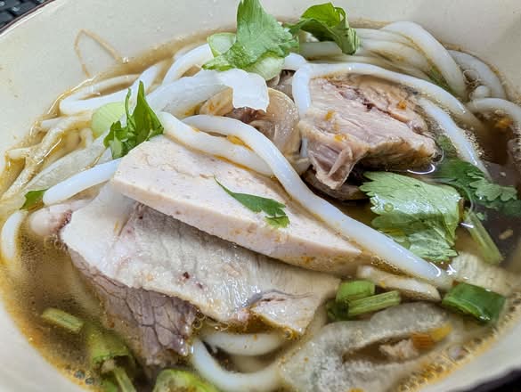 33. Beef & Pork in Spicy Beef Broth Rice Noodles.