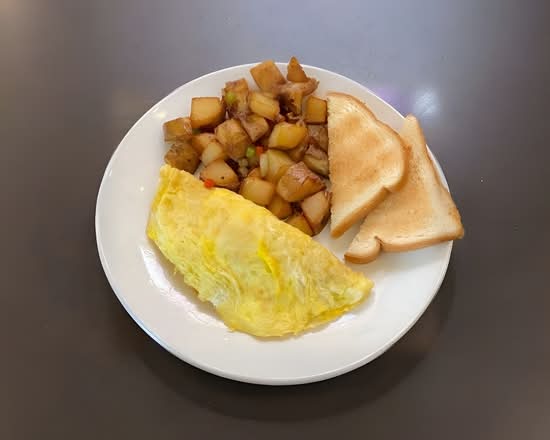 Tortilla Con Queso American Con Papas Casera / American Cheese Omelette with Home Fries.