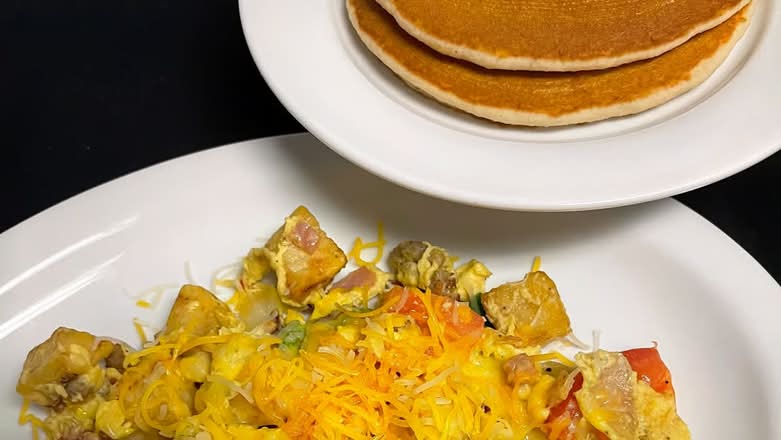 Santiago Scramble Plate with 2 Pancakes.