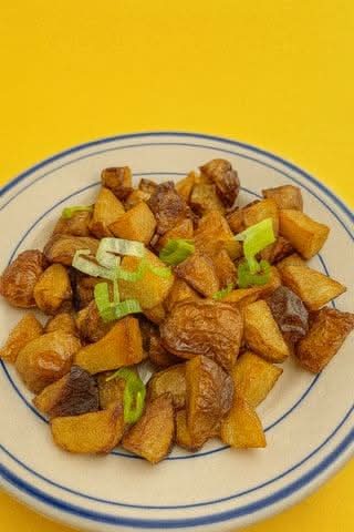 Side Cheddar and Onion Breakfast Potatoes.