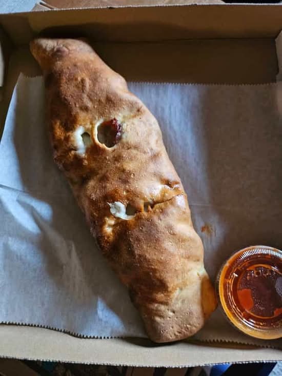 Personal Sausage, Pepper, & Onions Stromboli.