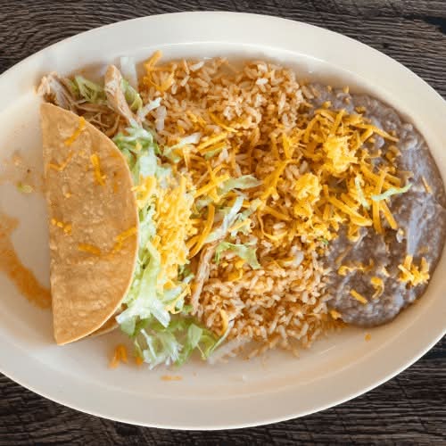 One Chicken Taco Combination with Soda & Chips.