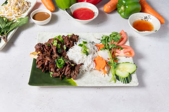 A9. Grilled Pork Skewers (2 ) - Thịt Nướng Xiên.