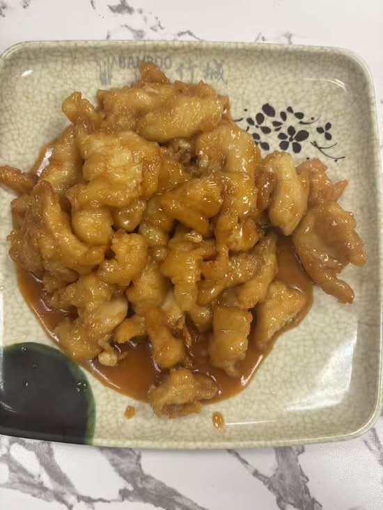 KM3. Orange Chicken.