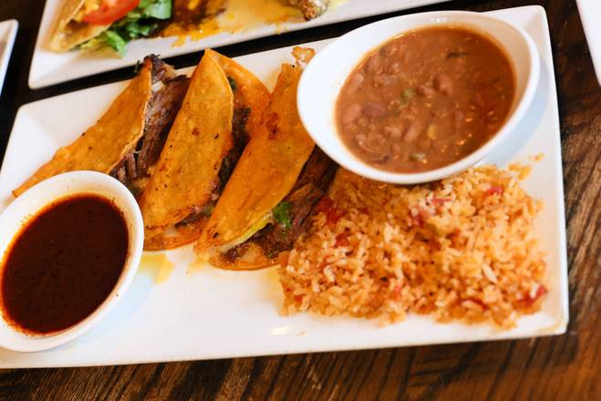 Ribs & Birria Tacos.