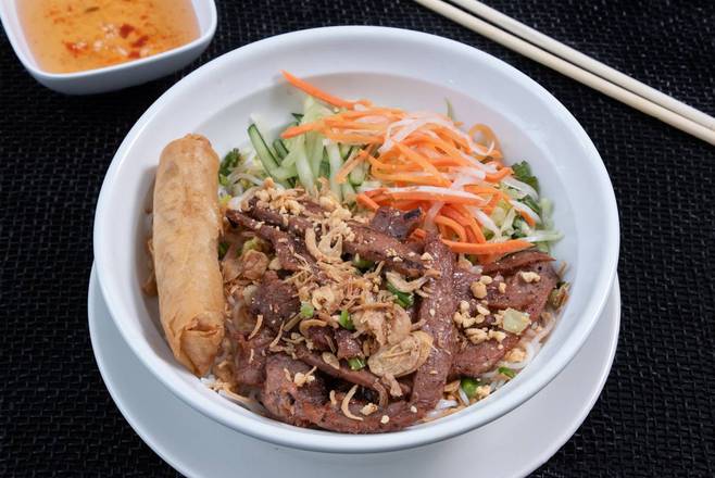 V5. Char-Grilled Marinated Chicken & Crispy Spring Roll over Vermicelli.