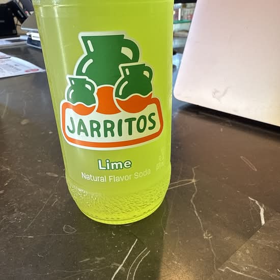 Jarritos Lime Soda 12 Oz Bottle.