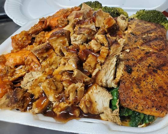 Jerk Chicken, Shrimp & Salmon Rice Platter.